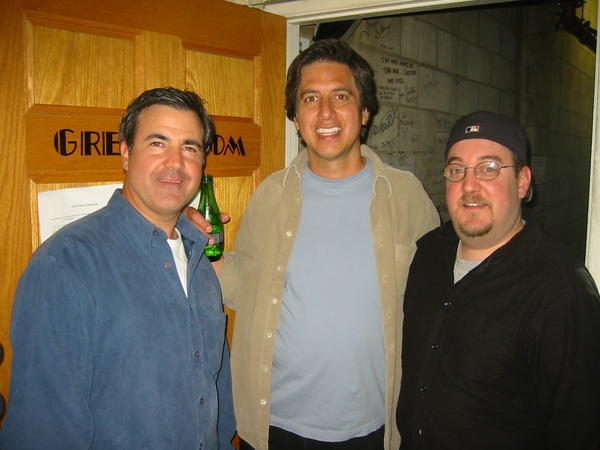 Brian Fischler with Ray Romano and another man standing outside a door marked Green Room.